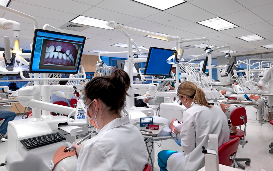 Dental schools are going high tech with hands-on and computer assist